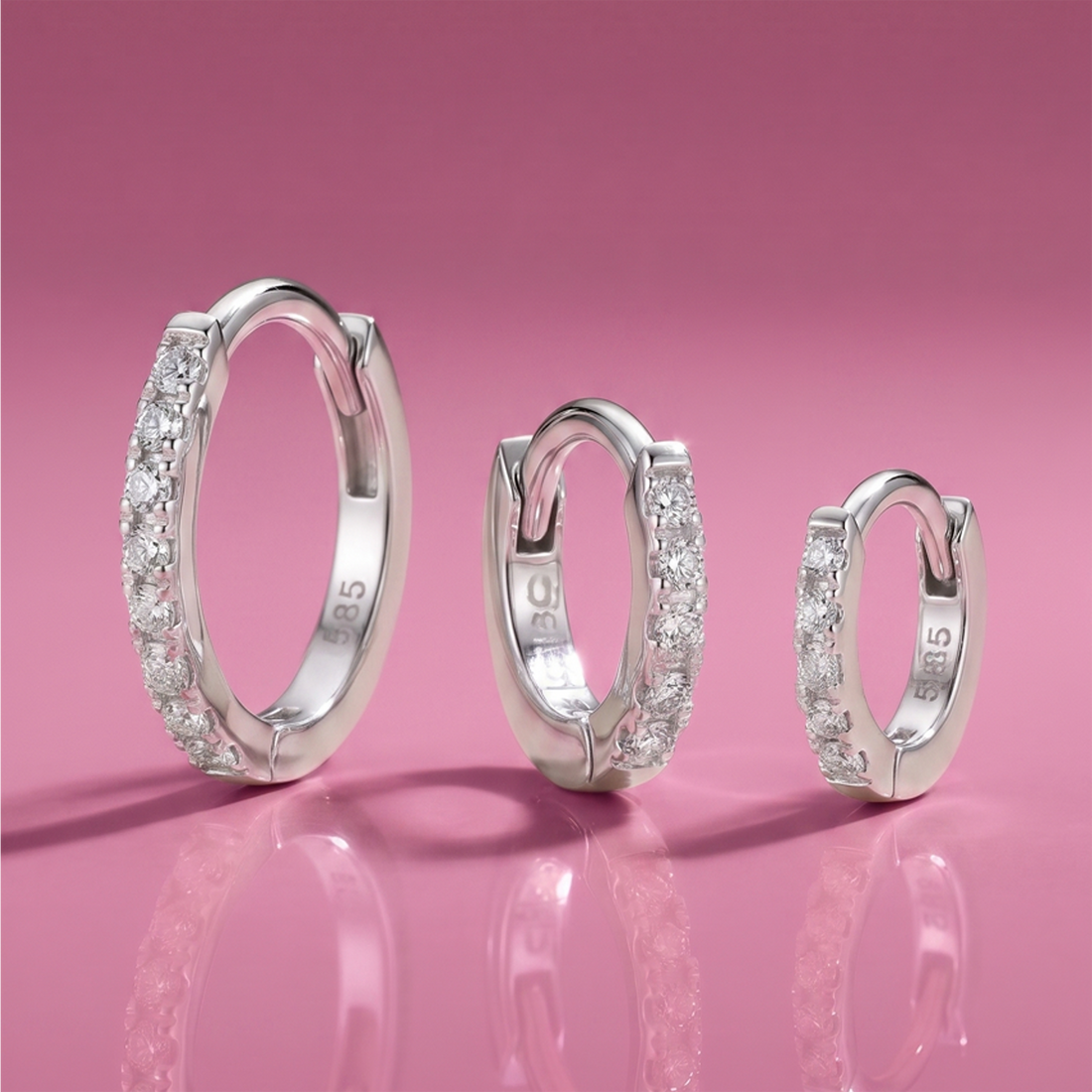 Upgrade your ear stack with white gold diamond huggies